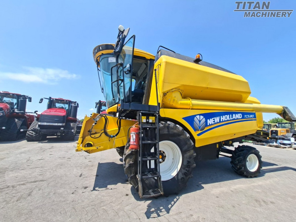 NEW HOLLAND TC580 și Heder 5.4 m + cărucior #TMR10601